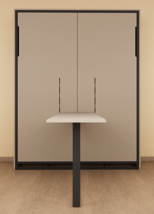 Modern office desk with glass partition against a beige wall